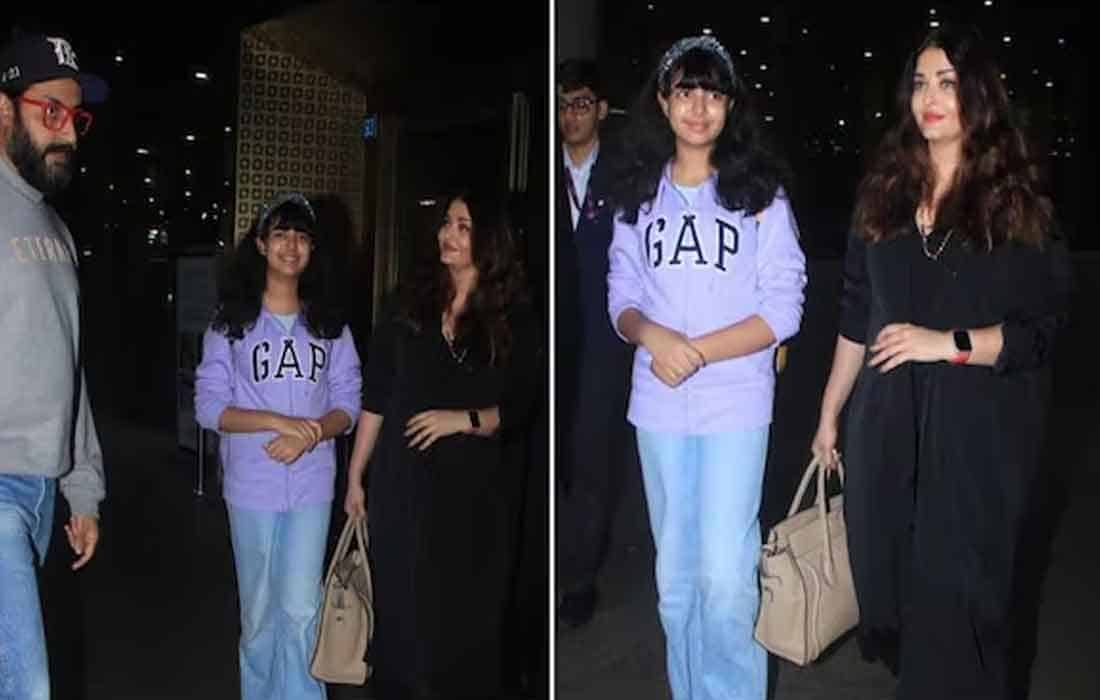 Aishwarya was seen in a black dress and red watch at the airport