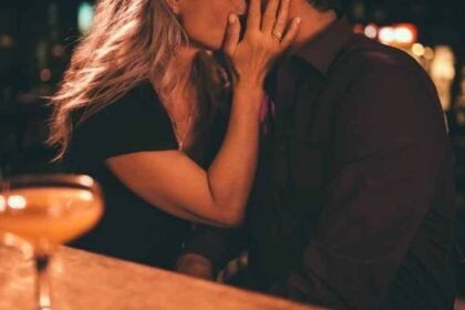 husband-kisses-wife-with-love-after-drinking-alcohol-woman-bites-tongue-till-then