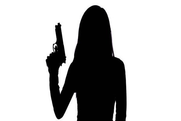WOMEN WITH PISTOL