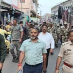 Giridih news, Durga Puja security, DC Ramniwas Yadav, SP Dr Bimal Kumar, flag march, QRT Giridih, Jharkhand news
